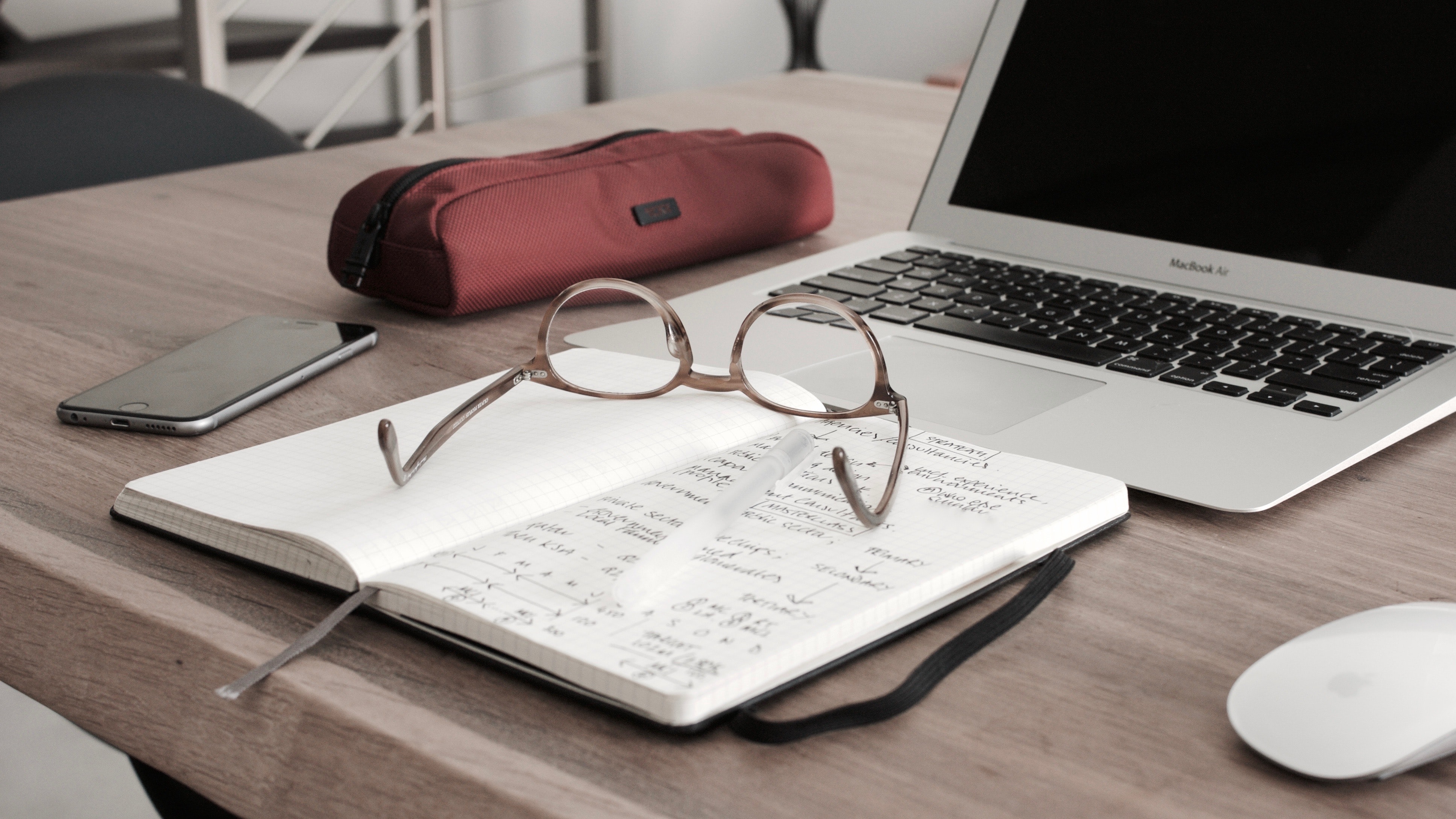 Computer and textbook on a desk