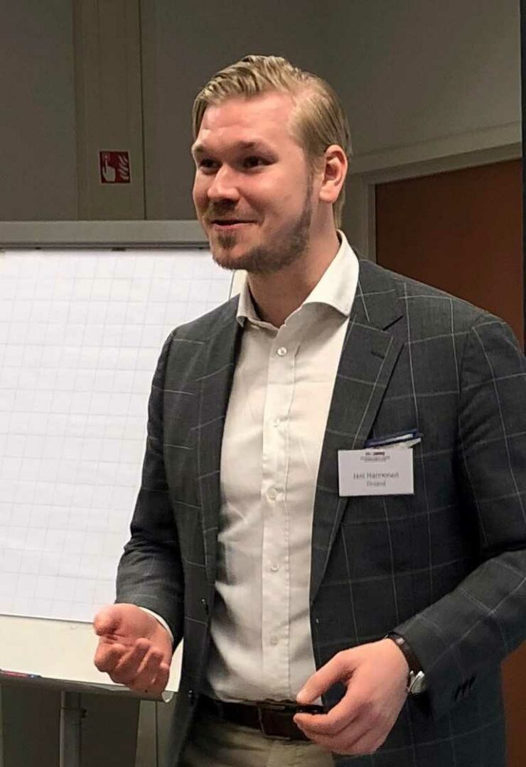 Photo of Jani Hannonen giving a presentation